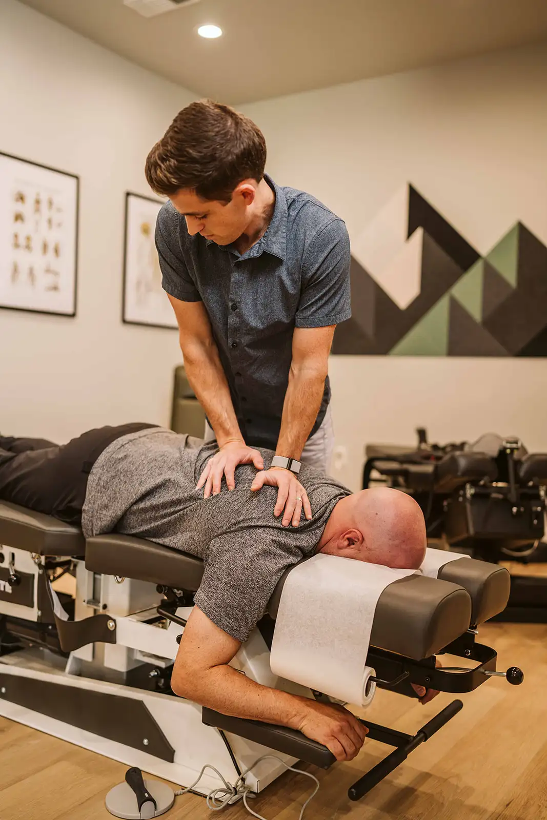 Dr. Hiebert providing a back adjustment at Summit Spine and Wellness