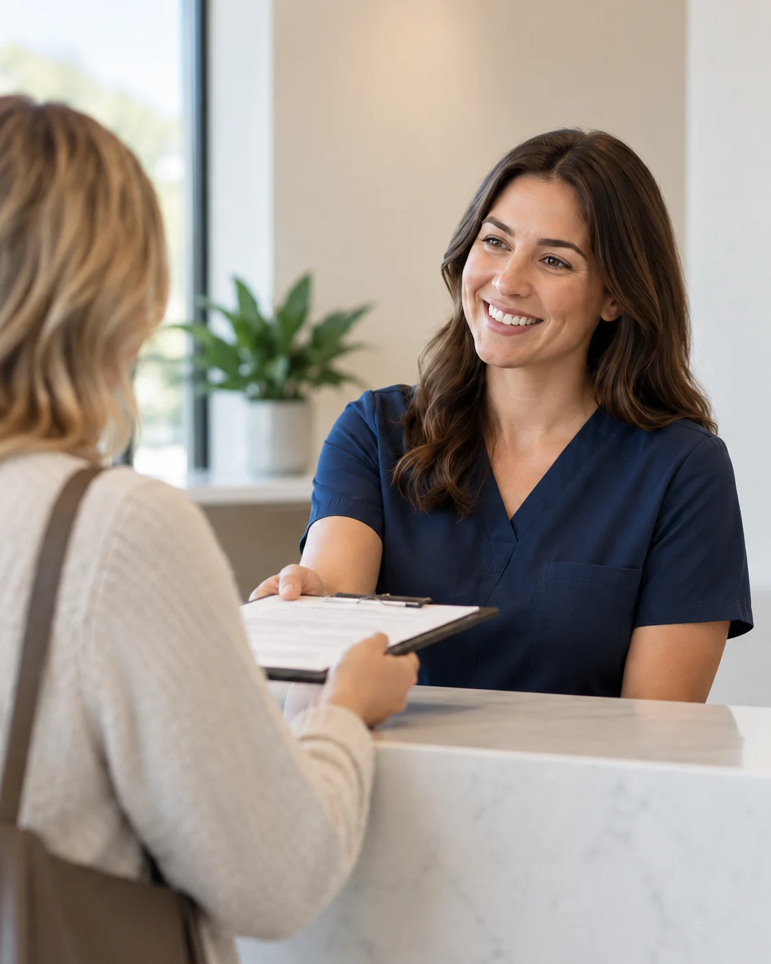 Discussing insurance information with a Summit team member