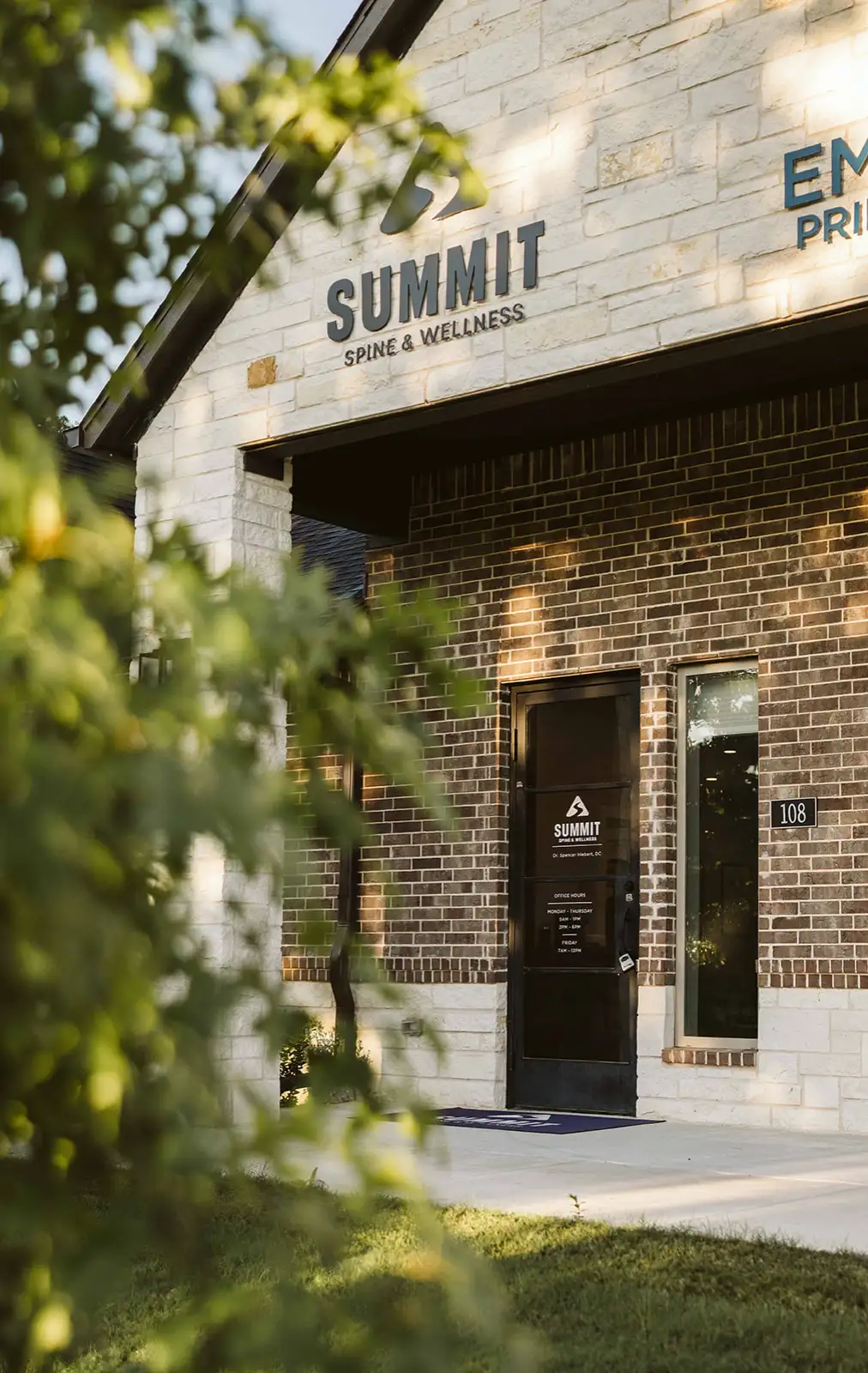 Summit Spine & Wellness exterior and entrance to Unit 108 in Colleyville
